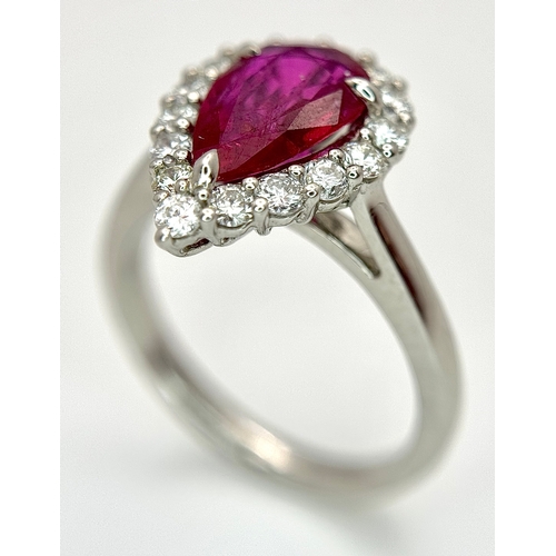 547 - A W.G.I. Certified 950 Platinum, Ruby and Diamond Ladies Cocktail Ring. A 1.68ct Indochine Pear cut ... 