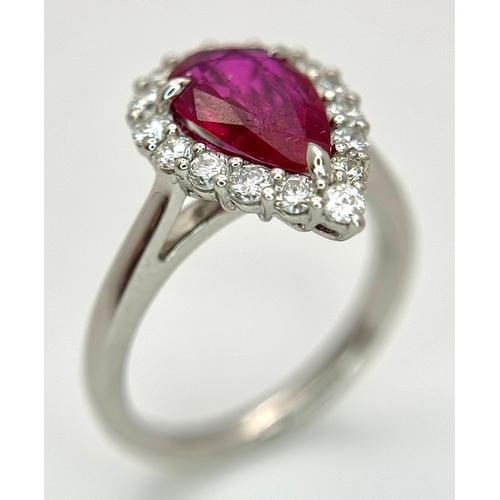 547 - A W.G.I. Certified 950 Platinum, Ruby and Diamond Ladies Cocktail Ring. A 1.68ct Indochine Pear cut ... 