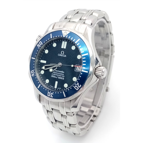 An Omega Seamaster Professional Automatic Gents Watch. Stainless steel bracelet and case - 36mm. Blue wave dial with date window. Water resistant to 300M. Comes with a Watch Register Report. In working order. PN-8329-1.
