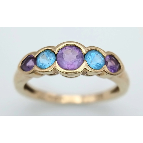 505 - A 9K GOLD RING WITH AMETHYST AND AQUAMARINE STONES .      2.2gms    size M