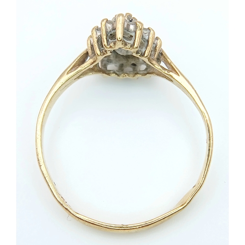 506 - A PRETTY 9K GOLD RING WITH TEARDROP SAPPHIRE CENTRE STONE WITH A HALO OF CZ STONES .     1.6gms    s... 