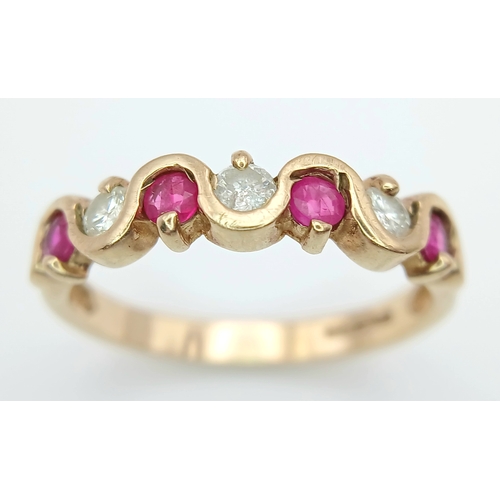 512 - A 9K GOLD RING WITH WHITE AND PINK STONES .    2.4gms    size P