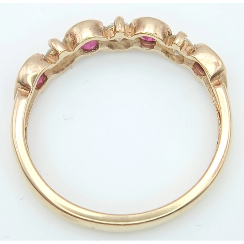 512 - A 9K GOLD RING WITH WHITE AND PINK STONES .    2.4gms    size P