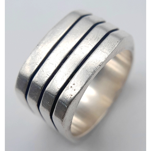 1035 - A Heavyweight Hallmarked Sterling Silver Wide Band Ring Size T. Measures 1.3cm wide and weighs 16.7 ... 