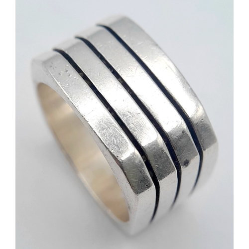 1035 - A Heavyweight Hallmarked Sterling Silver Wide Band Ring Size T. Measures 1.3cm wide and weighs 16.7 ... 