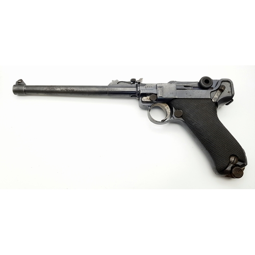A Deactivated German 9mm Luger. DWM 1915 make with 9 x 19mm Parabellum calibre. 8 inch barrel. Original 8 round magazine. Comes with an EU deactivation certificate. UK/EU sales only - Not Holland.