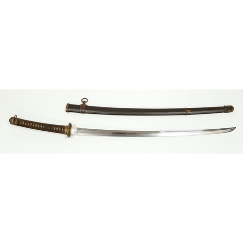 WW2 Japanese Officers Military Shin Gunto Sword with an older longer Katana Blade. Maybe a family blade for a tall officer. Lots of markings on the tang. The Hamon (wavy edge on blade) can clearly be seen. A very piece brimming with history. UK Mainland shipping Only