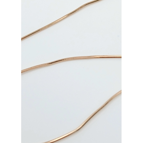 502 - A Pretty 9 Carat Gold Blue Topaz Set Pendant Necklace-41cm Length Chain. The Pendant is set with a v... 