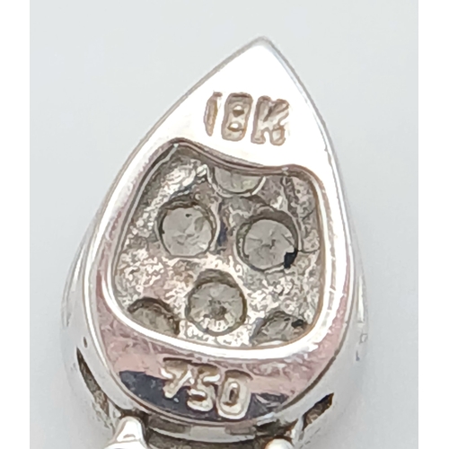 514 - AN 18K WHITE GOLD, DIAMOND SET, DROP PENDANT. 0.15TCW, 1.3G. SC 5038