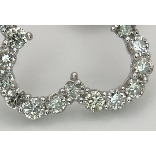 520 - A Pair of 18K White Gold and Diamond Clover Shaped Earrings. 1.26g. MT32.
