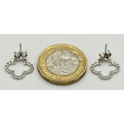520 - A Pair of 18K White Gold and Diamond Clover Shaped Earrings. 1.26g. MT32.