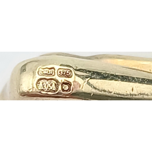 552 - A 9K YELLOW GOLD, DIAMOND SET CROSS PENDANT. 0.10TCW,2G. SC 5053