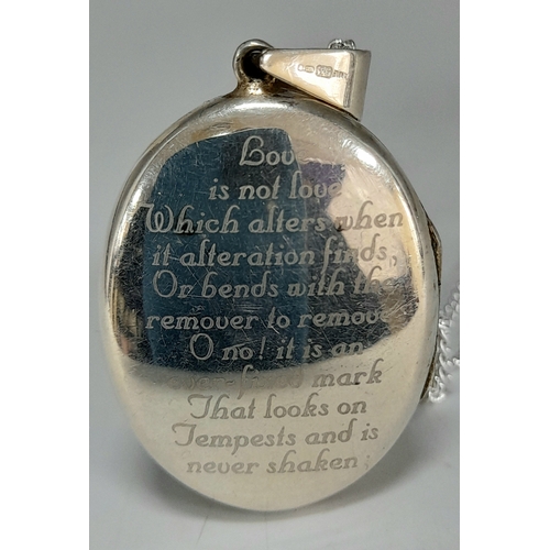557 - A Vintage Sterling Silver Scroll and Love Poem Detailed Locket Pendant on a later 46cm Sterling Silv... 