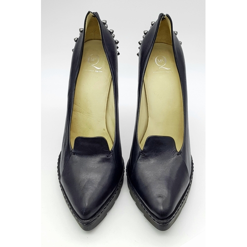 1054 - A Pair of Alexander McQueen Black Stud Heels. Leather exterior with stud embellishments. European si... 