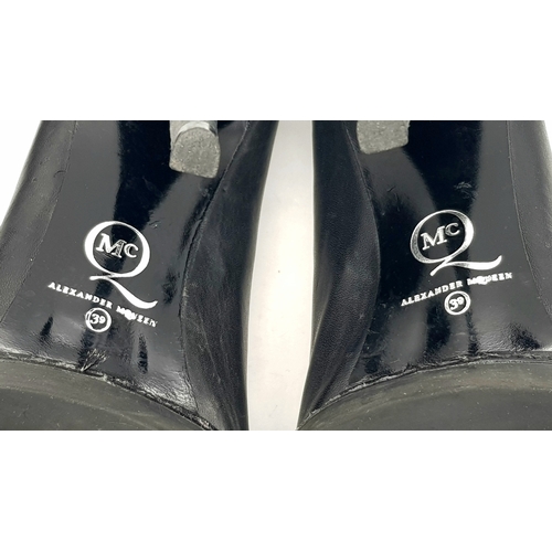 1054 - A Pair of Alexander McQueen Black Stud Heels. Leather exterior with stud embellishments. European si... 