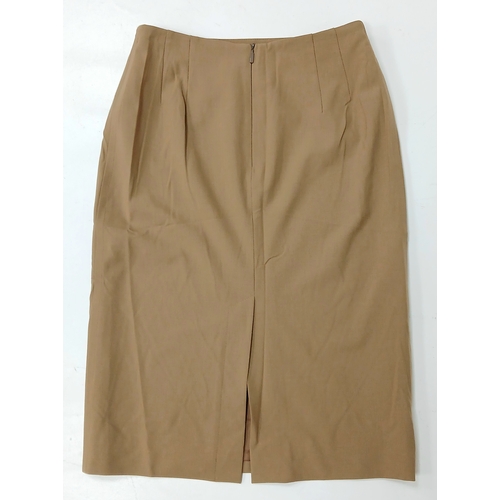 1075 - A Hugo Boss Camel Pencil Skirt. UK size 10. Zip to the back. Approximately 61cm length. In good cond... 