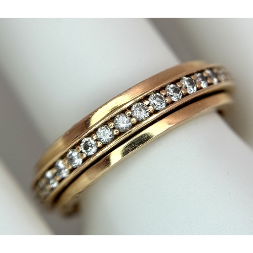 1004 - A 14K Yellow Gold Diamond Full Eternity Ring. Size L 1/2. 6.22g total weight. 0.62ctw with VS clarit... 