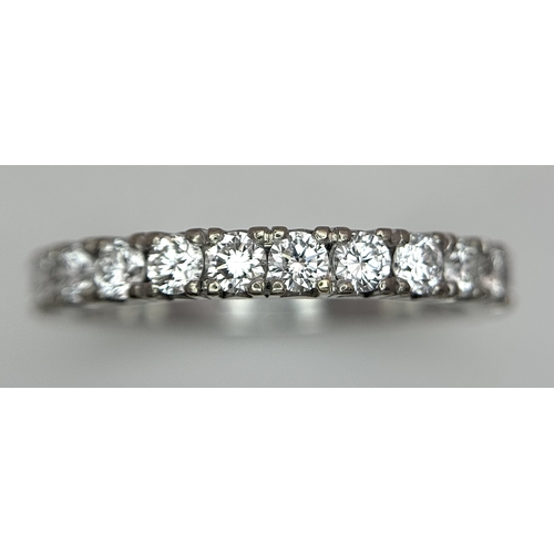 1018 - An 18K White Gold Lab Grown Diamond Half Eternity Ring. Size R. 4.2g. IIB/28055.
