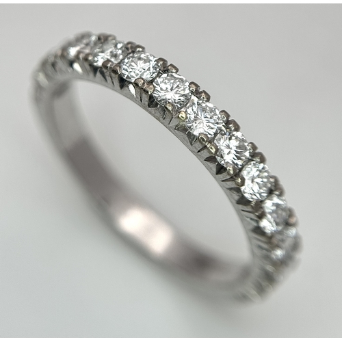 1018 - An 18K White Gold Lab Grown Diamond Half Eternity Ring. Size R. 4.2g. IIB/28055.