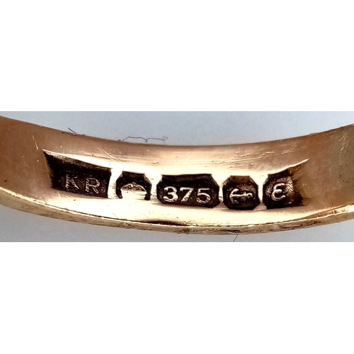 1025 - A 9K Yellow Gold Garnet Five Stone Ring. Size M. 4.2g. N26/11606.