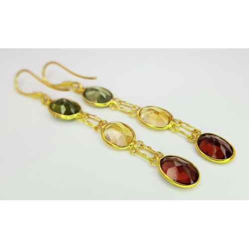 1103 - A Pair of 10K Yellow Gold Stone-Set Drop Earrings. 3.5cm drop. 1.25g. Comes with a coa. NL007.