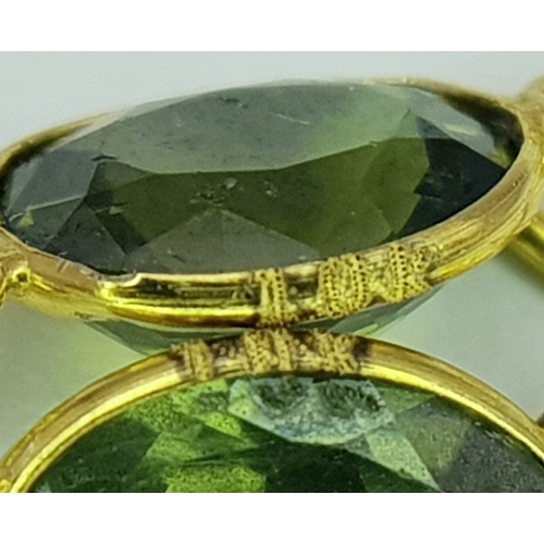 1103 - A Pair of 10K Yellow Gold Stone-Set Drop Earrings. 3.5cm drop. 1.25g. Comes with a coa. NL007.