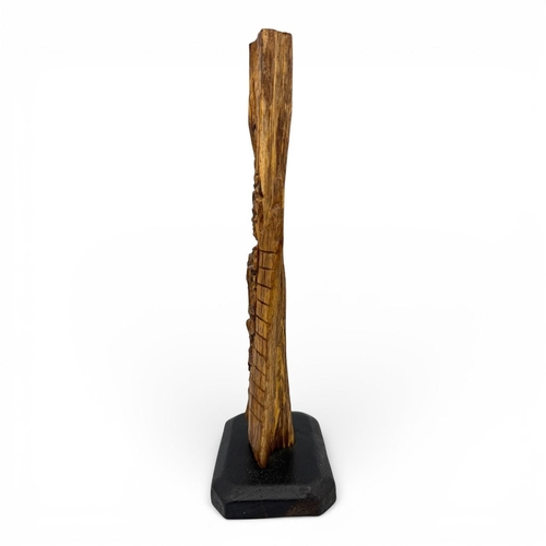 1012 - A magnificent Natural agarwood hand-carved relief depicting a seated Buddhist figure beneath swirlin... 