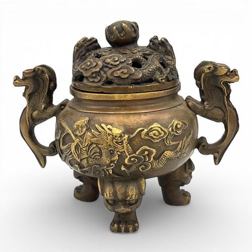 1170 - An Antique Chinese Bronze Tripod Incense Burner with Dragon Relief and Pierced Lid, Da Qing Qianlong... 