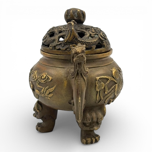1170 - An Antique Chinese Bronze Tripod Incense Burner with Dragon Relief and Pierced Lid, Da Qing Qianlong... 