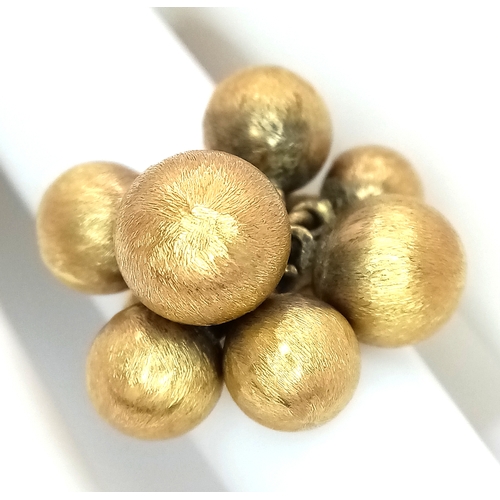 1010 - An 18K Yellow Gold Ornate Ball Ring. Different sized brushed gold balls. Size L. 8.45g.