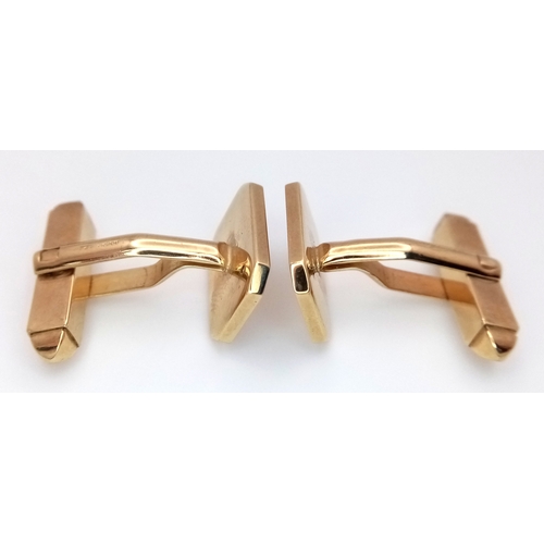 1024 - AN UNUSUAL PAIR OF 9K GOLD CUFFLINKS WITH A SMALL DIAMOND IN EACH - CELEBRATING 10 YEARS. 10.4g.