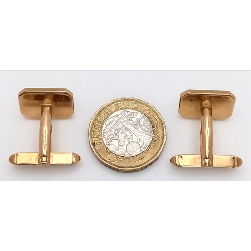 1024 - AN UNUSUAL PAIR OF 9K GOLD CUFFLINKS WITH A SMALL DIAMOND IN EACH - CELEBRATING 10 YEARS. 10.4g.
