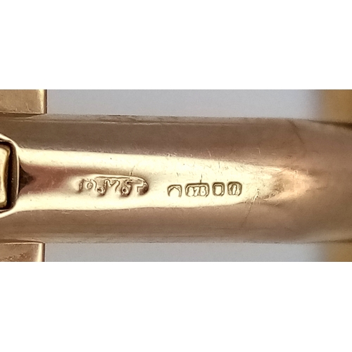 1024 - AN UNUSUAL PAIR OF 9K GOLD CUFFLINKS WITH A SMALL DIAMOND IN EACH - CELEBRATING 10 YEARS. 10.4g.