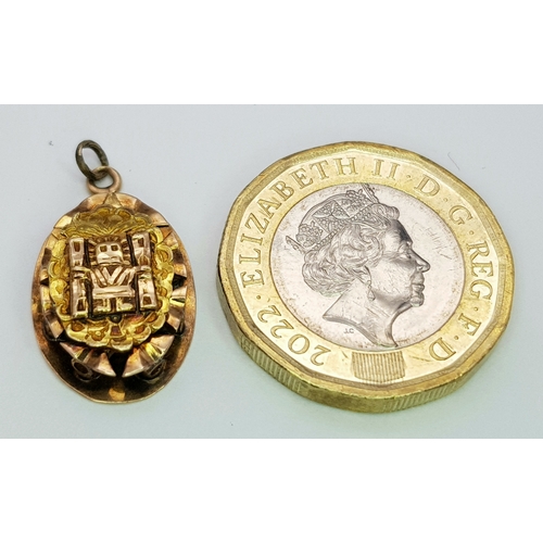 1053 - An 18K Gold Atocha Pendant. 2cm. 3g.