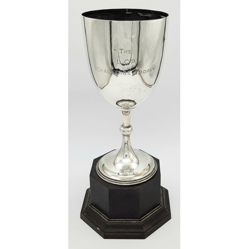 1081 - A Sterling Silver Cup Mounted on a Wood Base. Hallmarks for Birmingham 1920. Makers mark of Edgar an... 