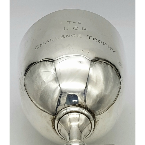 1081 - A Sterling Silver Cup Mounted on a Wood Base. Hallmarks for Birmingham 1920. Makers mark of Edgar an... 