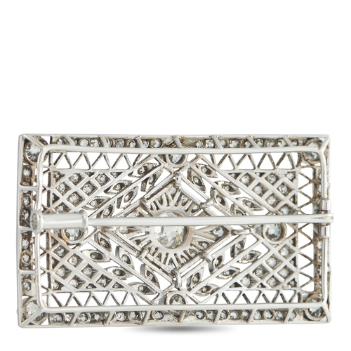 1055 - A Platinum 3.0ct Diamond Brooch. With an intricate openwork design, this luxury brooch draws inspira... 