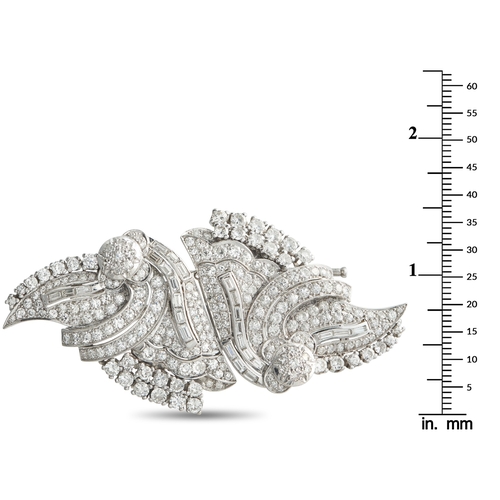 1062 - A Platinum 7.50ct Diamond Brooch. This luxury brooch is filled with dramatic details. Along with an ... 