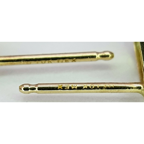 543 - A Pretty Pair of 9 Carat Gold Tear Drop Cut Peridot Stud Earrings. The Earrings are Set with 7mm Lon... 