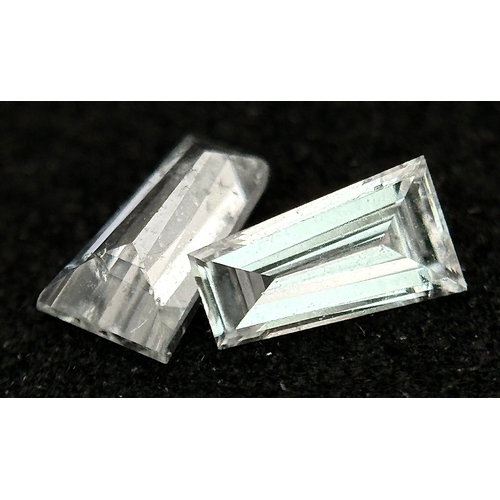 545 - A PAIR OF TAPERING BAGUETTE NATURAL DIAMONDS. 0.275TCW. ABSC 1006