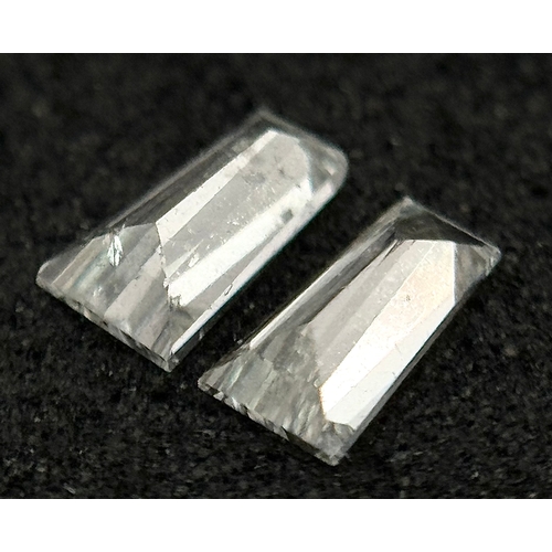 545 - A PAIR OF TAPERING BAGUETTE NATURAL DIAMONDS. 0.275TCW. ABSC 1006