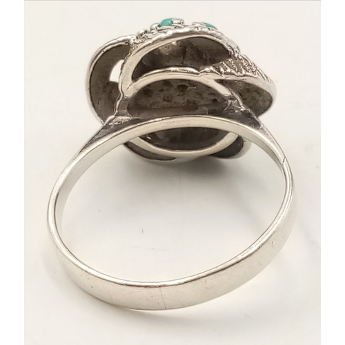 1056 - A Vintage, Possibly Navajo, Silver and Turquoise Set Ring Size N. Measures 1.6cm Wide at the Crown a... 