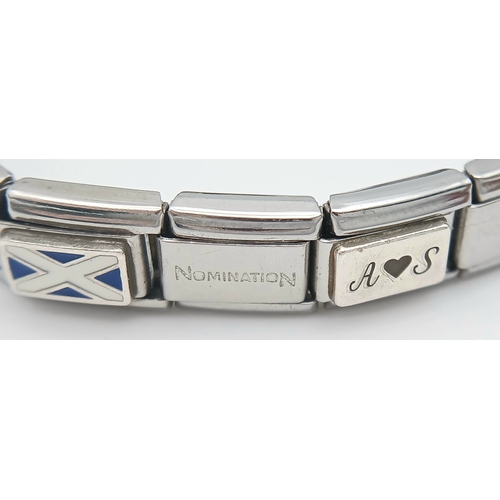 1113 - A NOMINATION BRACELET. 6 1/2