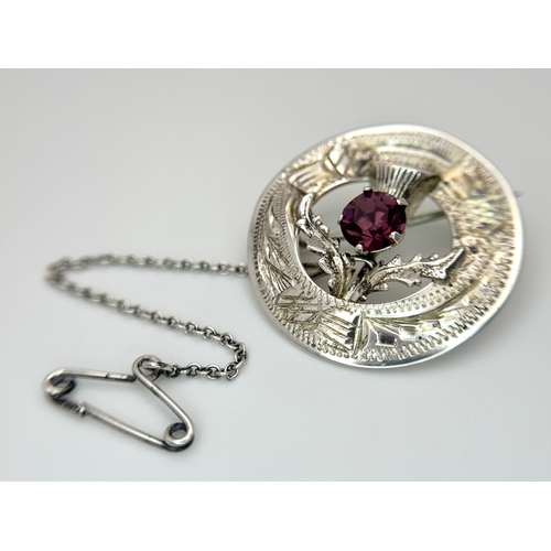 540 - A Vintage Ward Brothers Scottish Thistle Sterling Silver and Amethyst Brooch. 2.5cm diameter. Safety... 