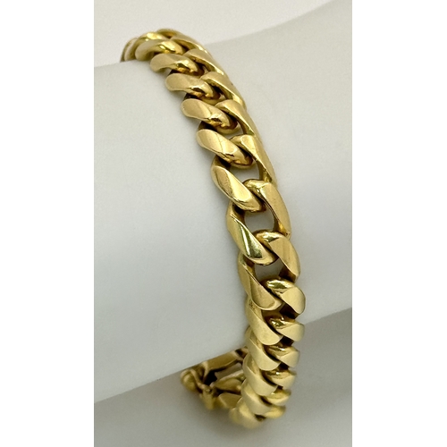 515 - A TIFFANY AND CO 18K GOLD CURB LINK BRACELET WITH BOX CLASP .          40gms        19cms