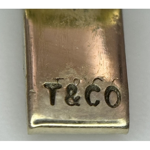 515 - A TIFFANY AND CO 18K GOLD CURB LINK BRACELET WITH BOX CLASP .          40gms        19cms