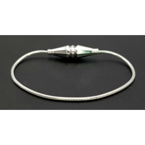 536 - A BUCHERON 18K WHITE GOLD DESIGNER BRACELET.        18.2gms      17cms
