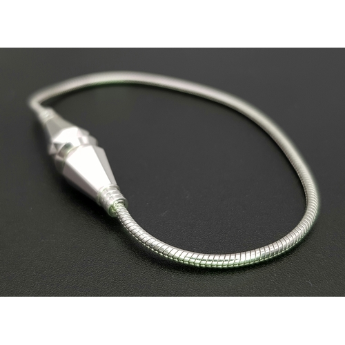 536 - A BUCHERON 18K WHITE GOLD DESIGNER BRACELET.        18.2gms      17cms