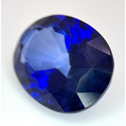 1115 - A W.G.I Certified Lab Grown 24.24ct Sapphire. Oval mixed cut.