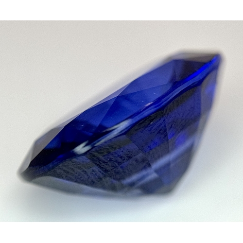 1115 - A W.G.I Certified Lab Grown 24.24ct Sapphire. Oval mixed cut.